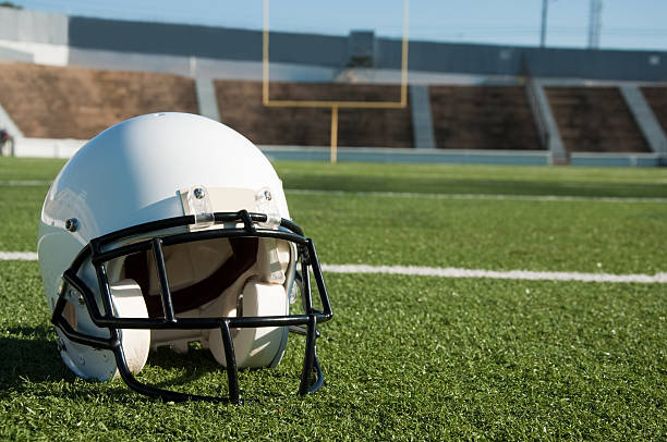 istock American Football  Helmet on Field 152141537
