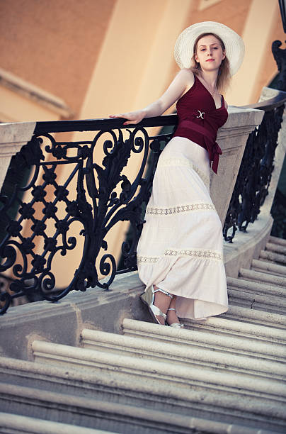 istock Young slim woman on stairs 152141557