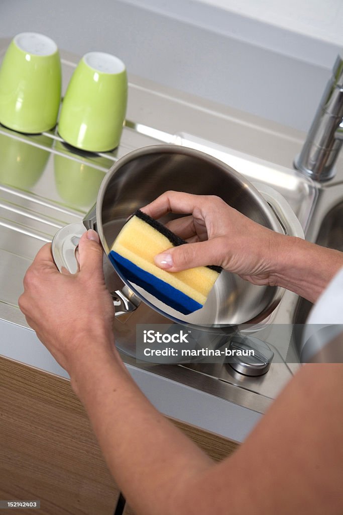 cleaning dish female cleaning dish Cleaner Stock Photo