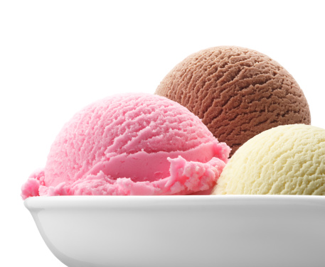 three scoops of ice cream against white background