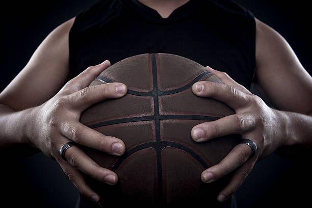 istock Male Grasping Basketball 152142748