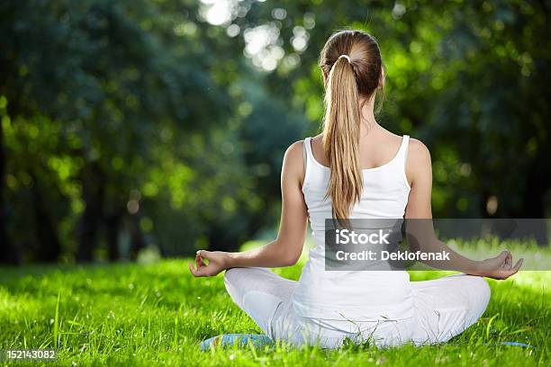 Lotus Stock Photo - Download Image Now - Rear View, Yoga, One Woman Only