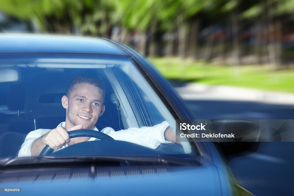 Winsock driver A young man goes to the car 20-29 Years Stock Photo