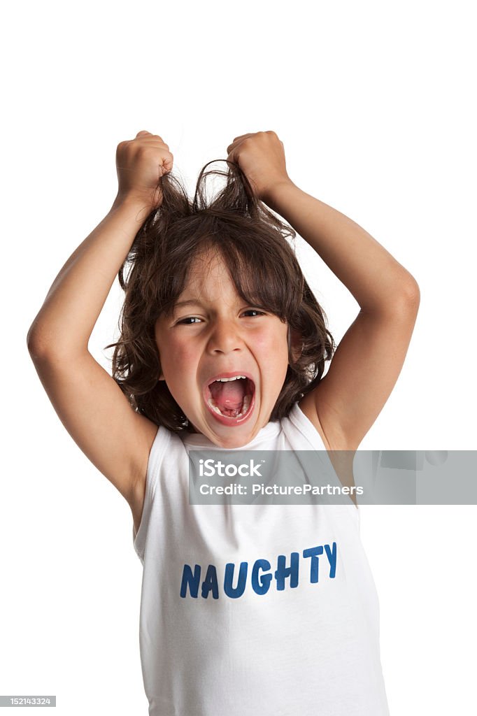 Screaming naughty boy Screaming naughty boy pulls his hair on white background 4-5 Years Stock Photo