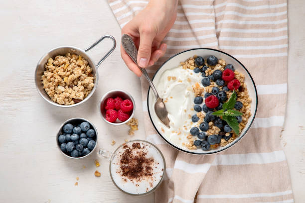 istock Healthy breakfast, cereal with berries and yogurt. 1521433890