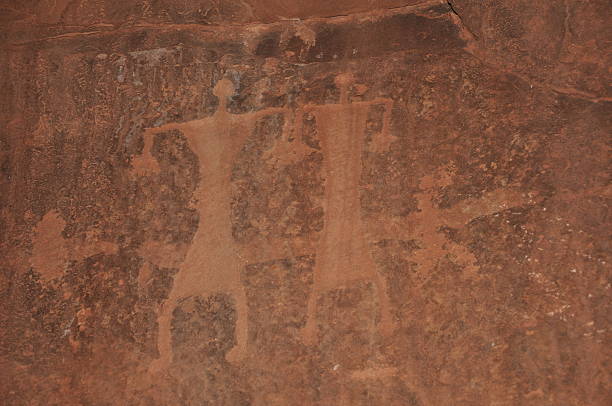 Wadi Rum persone Petroglyph - foto stock