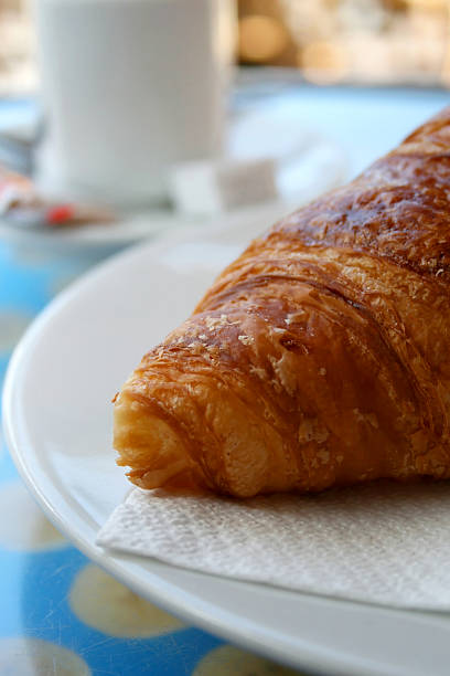 croissant and coffee stock photo