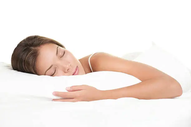 Photo of Woman sleeping on white background