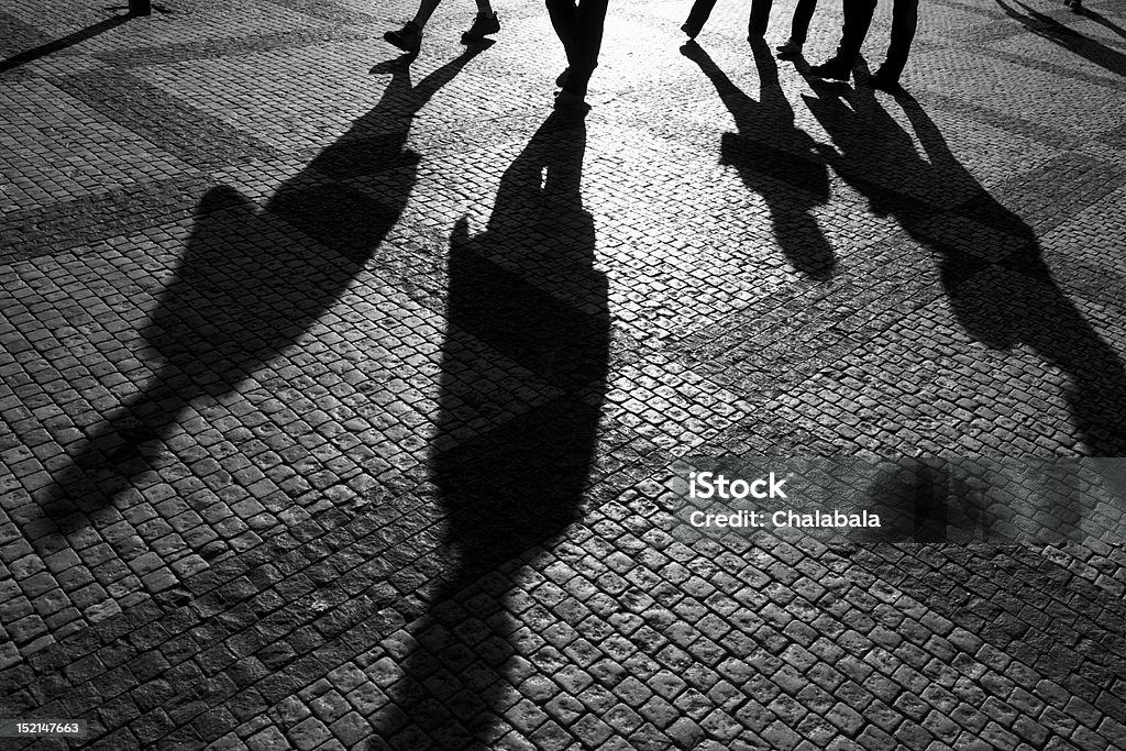 Shadows of people Shadows of people walking in a street of the city, Prague, September 2010. People Stock Photo