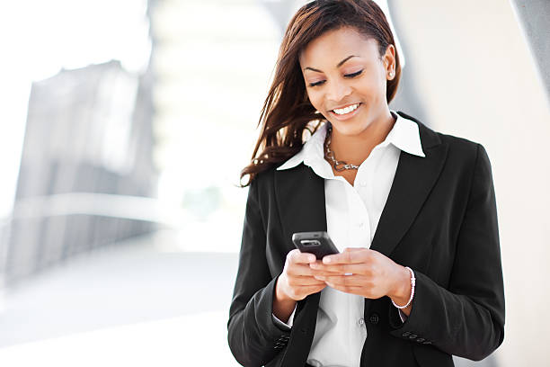 istock Black businesswoman texting 152149774
