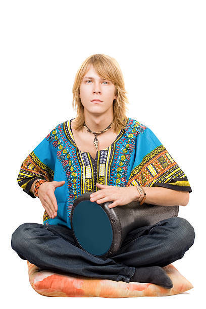 istock The young man plays a drum. Isolated 152150020