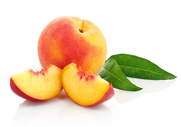 istock fresh peach fruits with green leaves 152152200