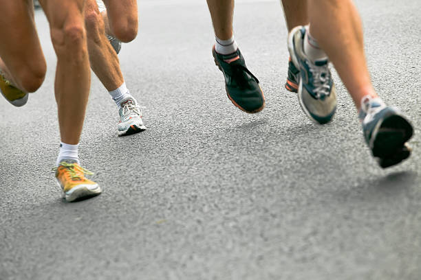 istock People running in city marathon 152152261