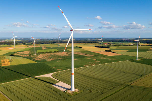 istock Wind turbines in summer landscape 1521528331