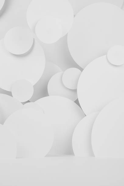 istock White abstract background of fly circles pattern with perspective, floor as stage mockup for presentation cosmetic products, goods, advertising, design in elegant soft light modern urban style. 1521531874