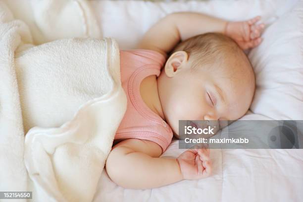 Sweet Little Newborn Baby In A Bed Stock Photo - Download Image Now - Babies Only, Baby - Human Age, Baby Girls