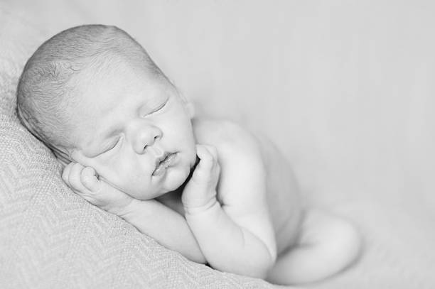 istock Peaceful Newborn Girl 152154668