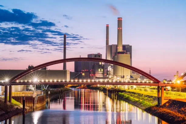Dusk view of Germany's largest coal-fired power plant near Mannheim.
Large power station on the River Rhine at dusk.