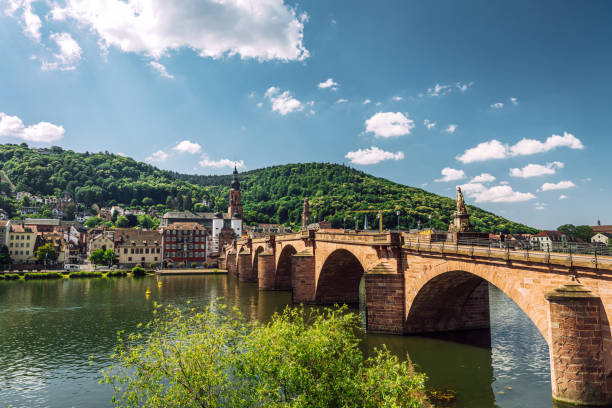 istock Bridge in Heidelberg and Necker River Valley with Forest Hills 1521552653