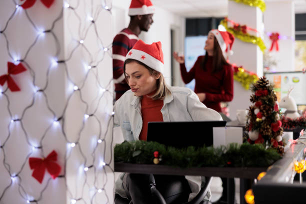 istock Annoyed employee in xmas themed office 1521567690