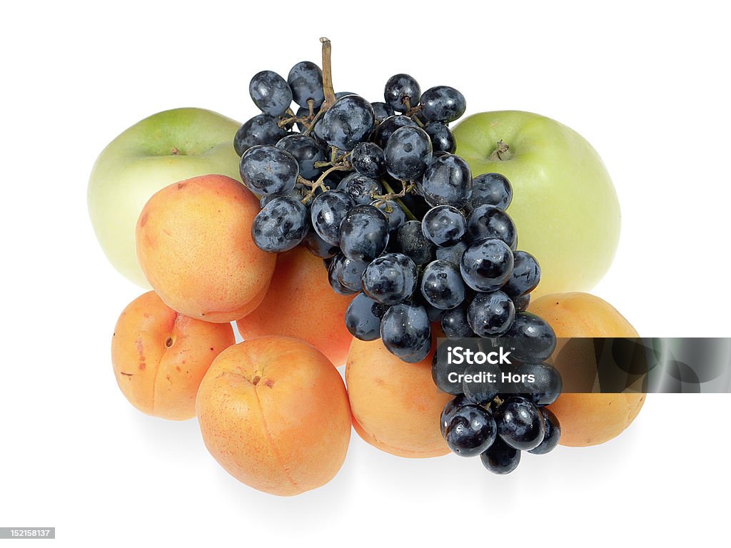 Fruit on a white background Grapes, apricots and apples isolated on a white background Apple - Fruit Stock Photo