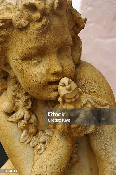 Cherub Statue Stock Photo - Download Image Now - Angel, Beige, Cheerful