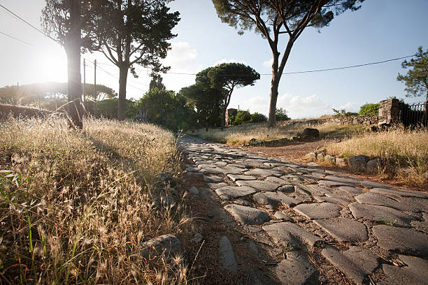 istock The Appian way in Rome at sunset 152158328