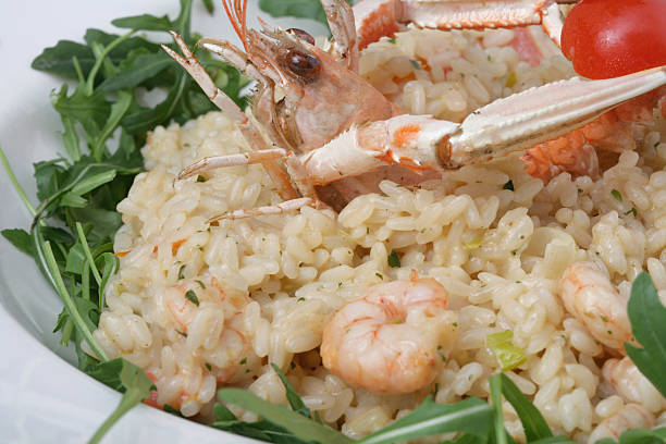 risotto - food rice lobster scampi photos et images de collection