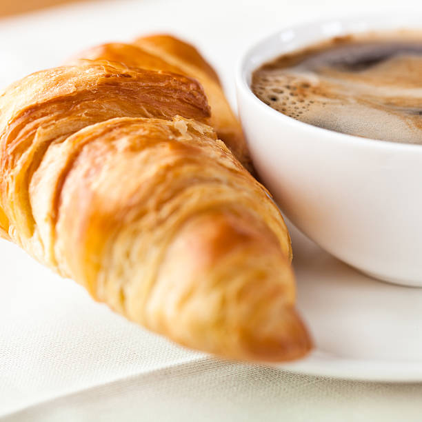 istock Croissant and a cup of delicous coffee 152158371