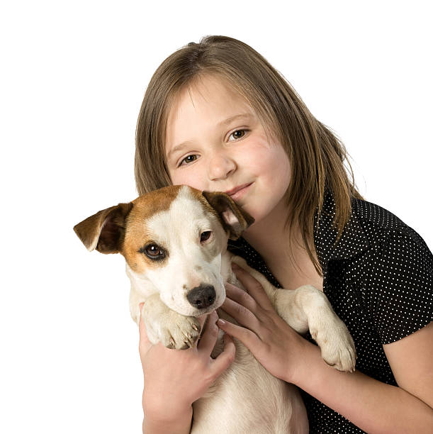 istock Child holding puppy 152158840