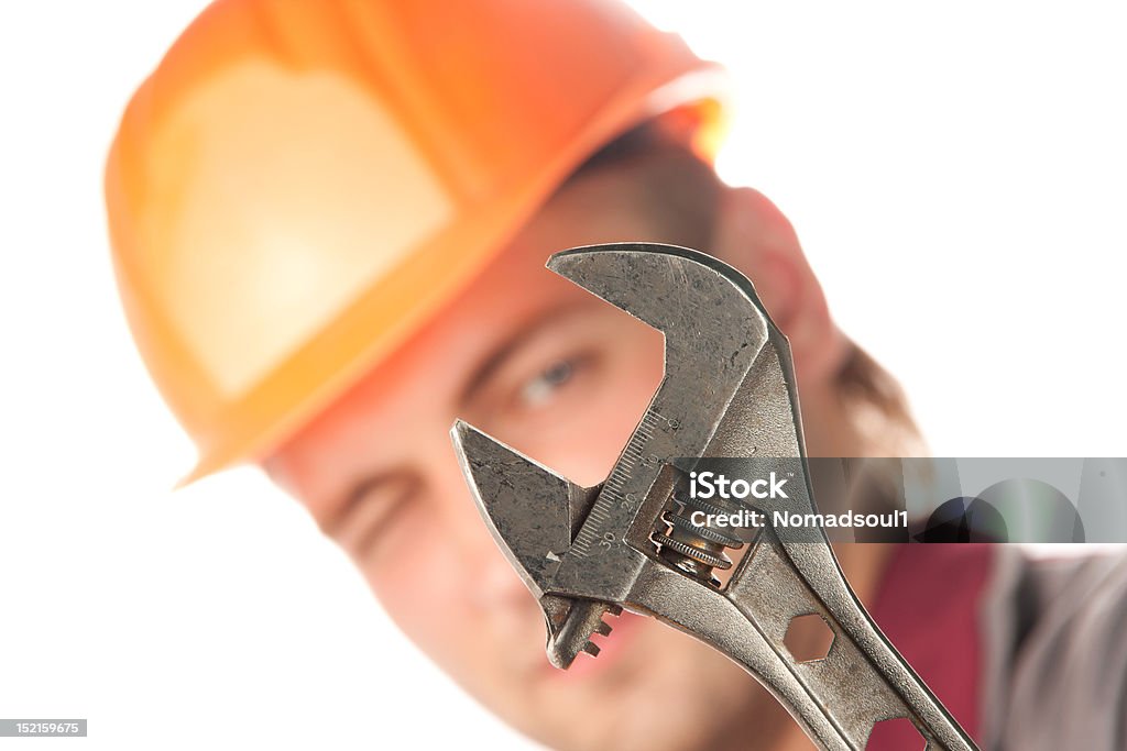 Trabajador con llave ajustable - Foto de stock de Accesorio de cabeza libre de derechos