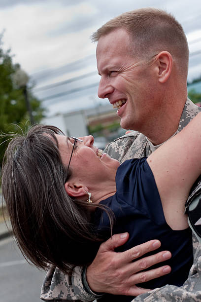 Soldier and wife re-united stock photo
