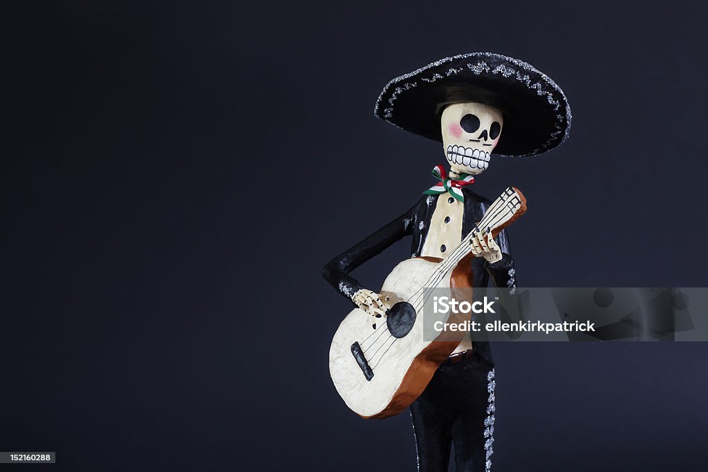 Day of the Dead doll Mariachi Guitarron player The Catrina, or Day of the Dead doll, is one of the most popular figures of Mexican Dia De Los Muertos (Day of the Dead). Day of the Dead celebrations, which occur during two days, November 1 and 2, correspond with the Catholic holy days of All Saints Day and All Souls Day. Day Of The Dead Stock Photo