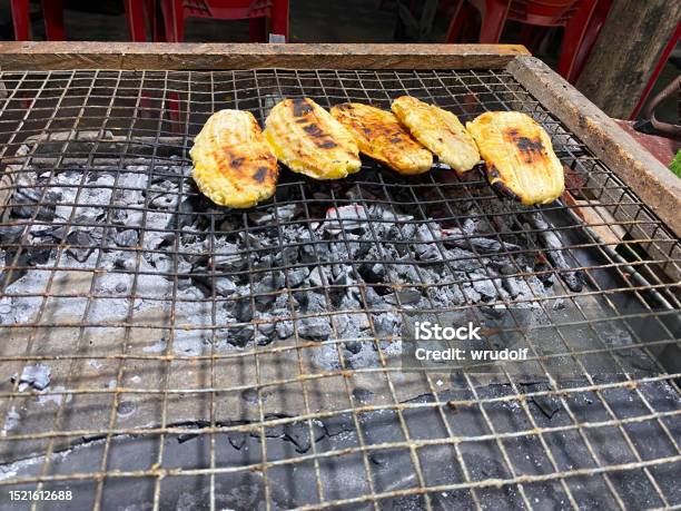 Pisang Gapit Or Pisang Epe Or Grilled Bananas The Indonesian Traditional Cakes Served With Coconut And Palm Sugar Or Brown Sauce Mostly Found In Sulawesi Or Makassar City Stock Photo - Download Image Now