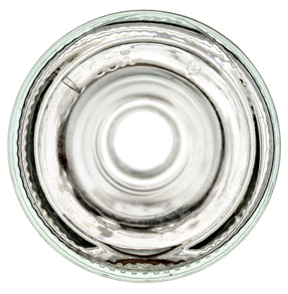 Bottom of a glass bottle on a white background