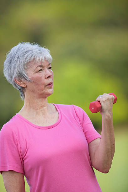istock Senior Woman Lifting Hand Weight 152161670