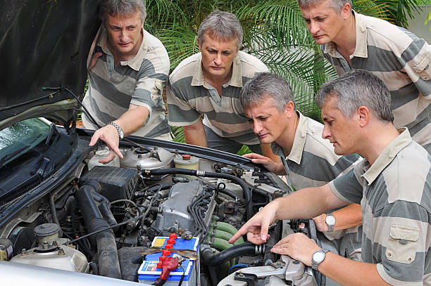 Engine trouble Composite of five of the same man looking at a car engine same person multiple images stock pictures, royalty-free photos & images