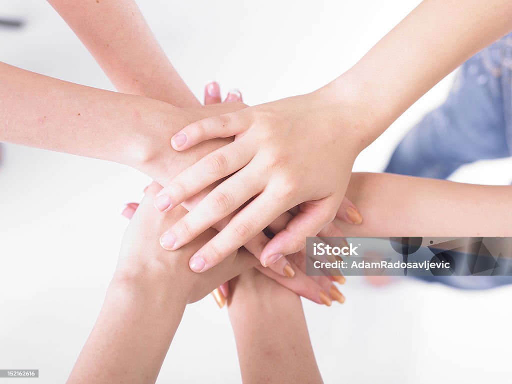 Business team join hands Business team join hands on white background Business Stock Photo