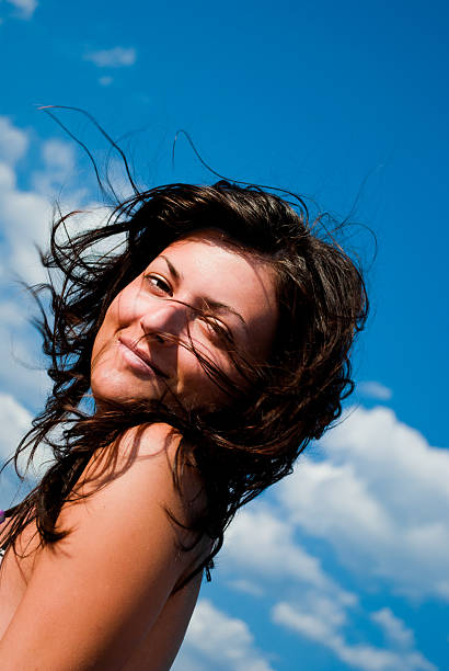 istock Young Woman over blue Sky 152163475