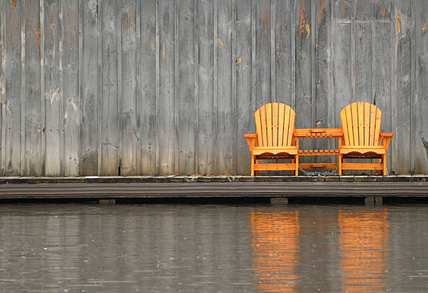 Free Stock Photo of Rustic scene with two chairs against a wooden barn ...