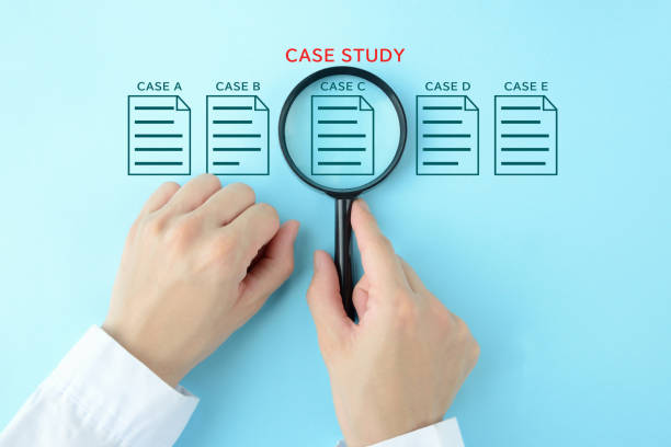istock Human's hand using magnifying glass and report pictogram with case study word 1521672133