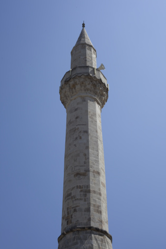 bosnian minaret, towering over mostar's blue sky