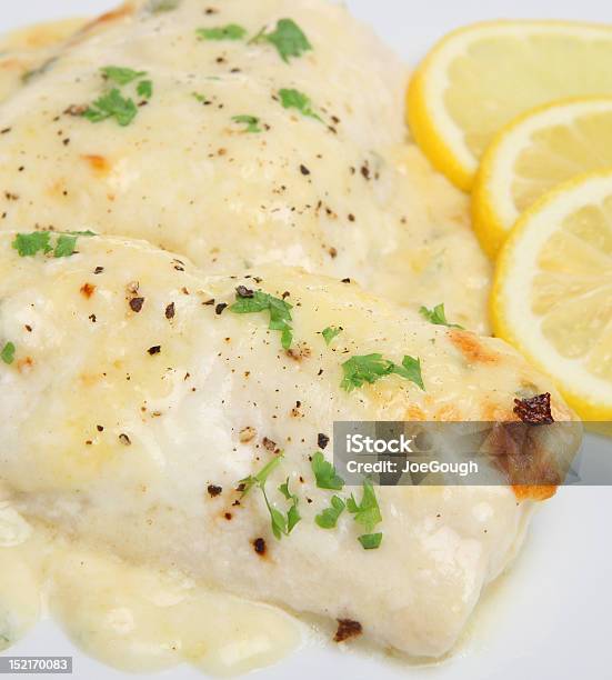 Baked Fish In Cheese Sauce Stock Photo - Download Image Now - Baked, Haddock, Cheese