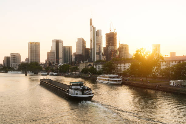 istock Ship and Frankfurt skyline at sunset, Frankfurt am Main, Germany 1521708256