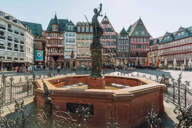 Römerberg with fountain and Statue of Justitia, Old town in Frankfurt am Main, Germany