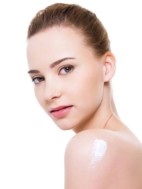 istock woman with cosmetic cream on shoulder 152171274
