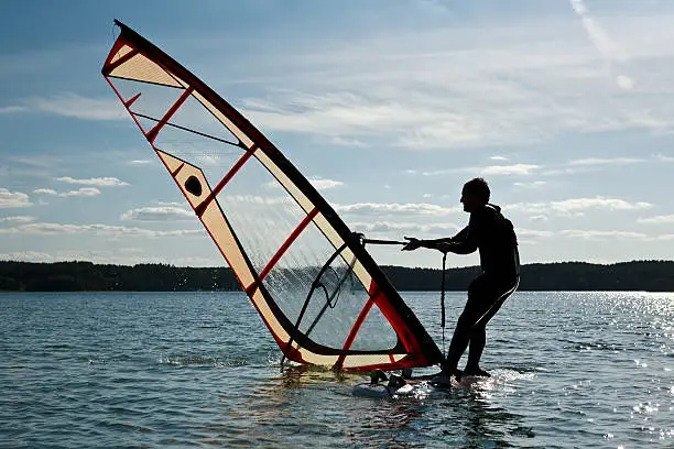 Windsurfing lessons on the lake, pick-up sail