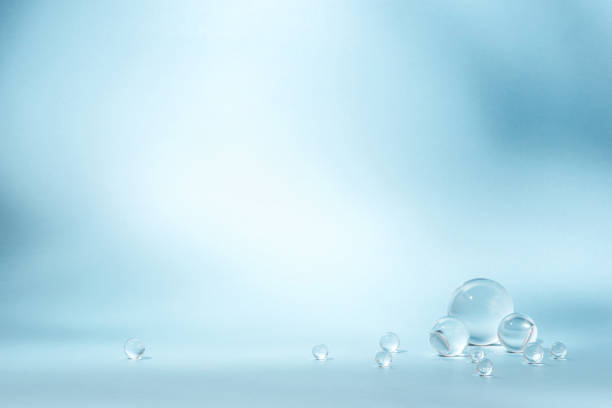 istock Blue background with transparent glass balls. 1521718212