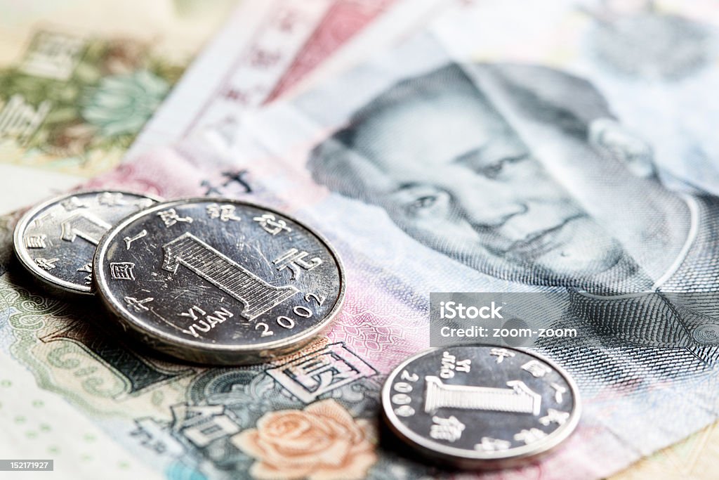 Chinese yuan Chinese yuan renminbi banknotes and coins close-up 10 Yuan Note Stock Photo