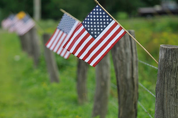 istock American Flags on Rural Fence 152172897